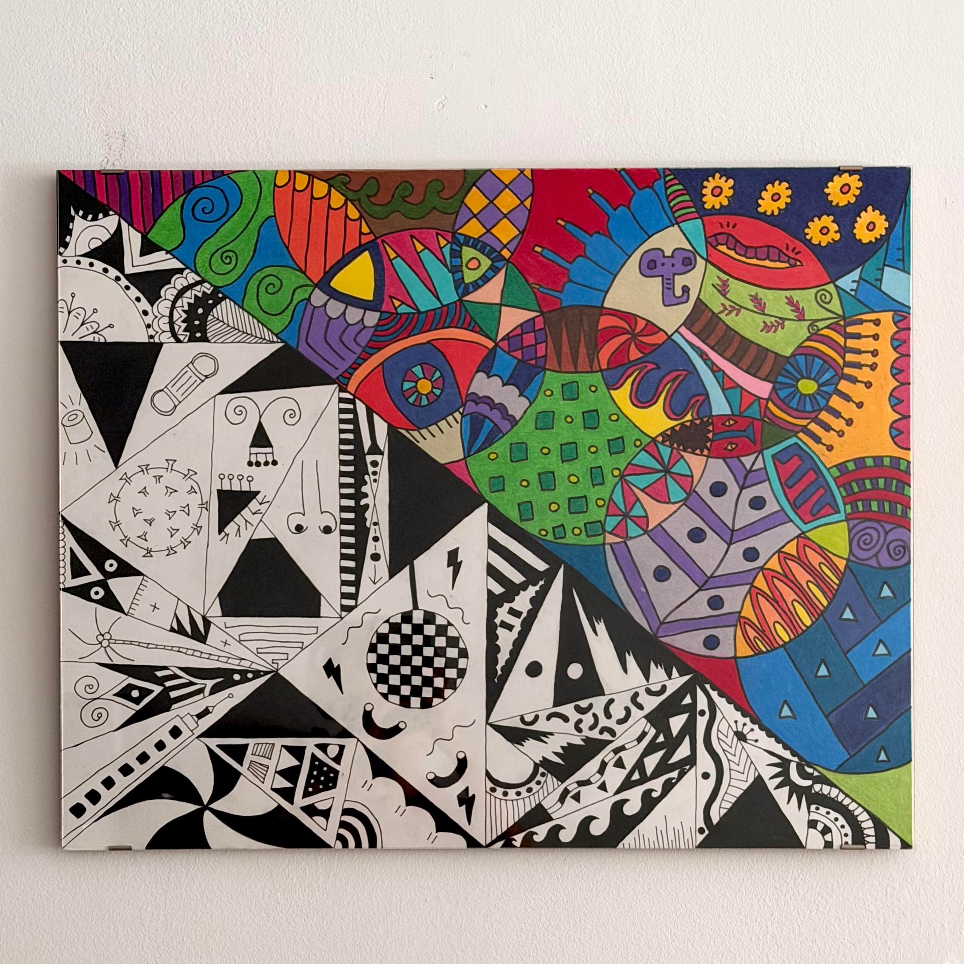 Abstract geometric painting split between monochrome patterns and vibrant multicolored circles.